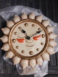 orologio più vaso in cera. 