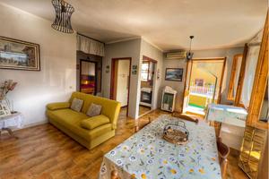 Trilocale con 110 mq cortile privato