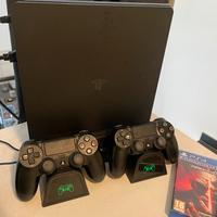 ps4 slim+ base di ricarica + 2 joystick + 3 giochi