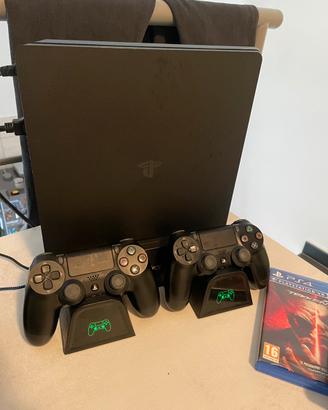 ps4 slim+ base di ricarica + 2 joystick + 3 giochi