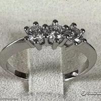 ANELLO TRILOGY ORO 18kt. E DIAMANTI NATURALI 0,52