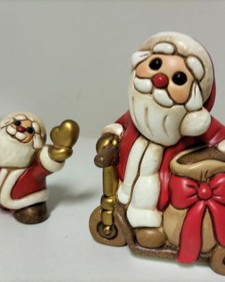 Coppia babbo natale monopattino