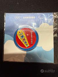 Spilla olimpiadi 2026, samsung BOB