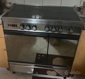 Cucina in acciaio inox a gas con forno elettrico