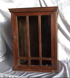 Mobile farmacia antico con anta in vetro