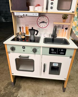 Cucina giocattolo più carrozzina