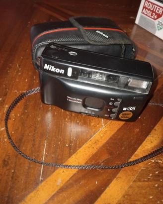 macchina fotografica canon  rullino