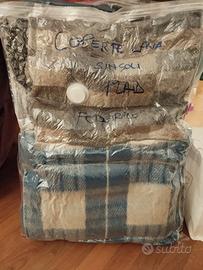 Coperte varie in lana per letto singolo