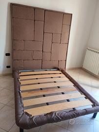 Rete letto con poggia testa