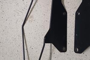 Attacchi per borse laterali moto