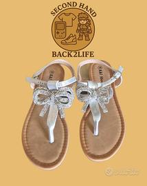 Sandalo estivo da donna con fiocco argento