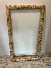 Grande cornice in legno rivestita