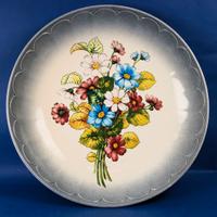 Grande piatto decorativo in ceramica.