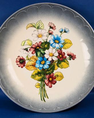 Grande piatto decorativo in ceramica.
