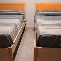 letti singoli e letto matrimoniale contenitore