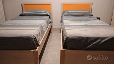 letti singoli e letto matrimoniale contenitore