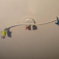 Lampada a tre luci con pesci colorati