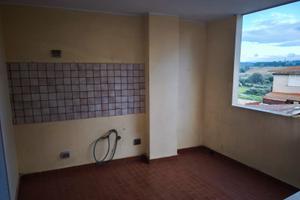 Trilocale con terrazzino, posto auto ed ascensore