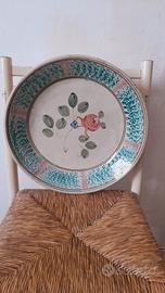 Piatto antico in terracotta dipinto a mano raro.