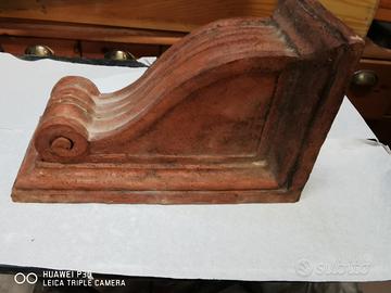 reggi mensola in terracotta