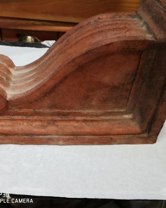 reggi mensola in terracotta