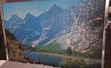 puzzle incorniciato montagne e lago pescatore