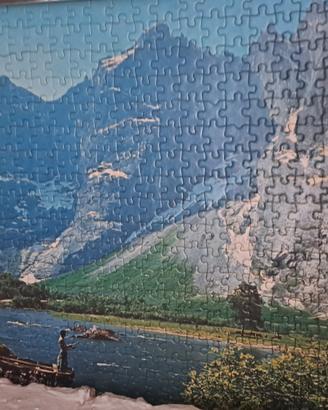 puzzle incorniciato montagne e lago pescatore