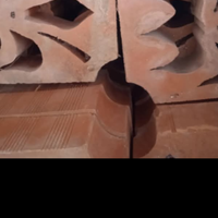 Frangisole in cotto modello giglio