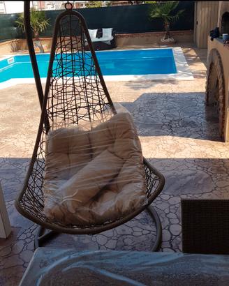sedia a dondolo da giardino