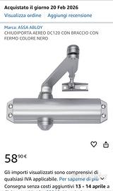 Chiudiporta con fermo Assa Abloy