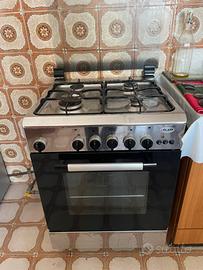 Cucina a gas 4 fuochi e forno