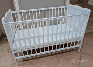 Lettino a sbarre,lenzuola,2 materassi,sacco nanna