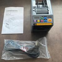 Distributore automatico di nastri taglierina