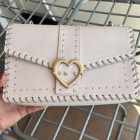 Borsa donna colore rosa motivi