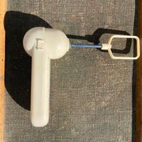 Sbattitore con una frusta