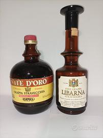 vecchie bottiglie di grappa vintage
