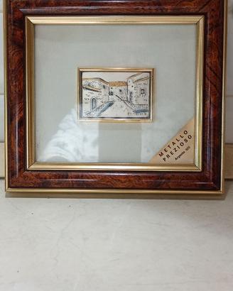 Placca in argento con cornice in legno