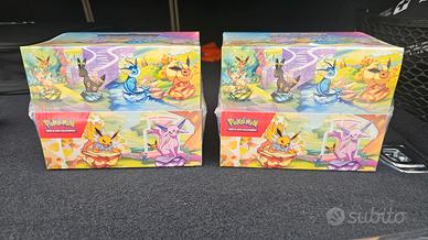 Box mini tin pokemon evoluzioni prismatiche sealed