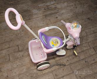 triciclo con maniglia di comando con carillon. 