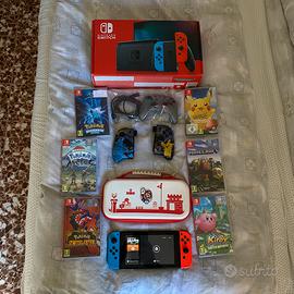 Nintendo Switch con vari giocchi e accessori