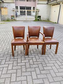 poltroncina e due sedie