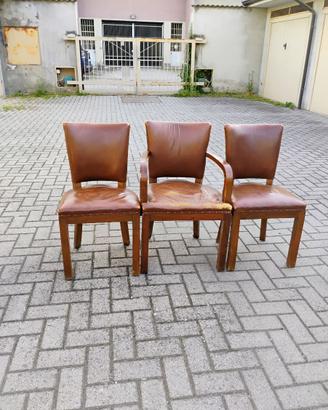 poltroncina e due sedie