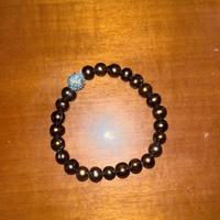 bracciale con perle marroni e swarovski al centro