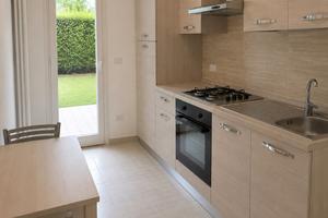 Bilocale con giardino privato