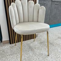 Poltroncina/sedia a conchiglia