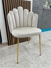 Poltroncina/sedia a conchiglia