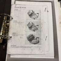 Dossier con moltissimi cataloghi e immag moto ‘70