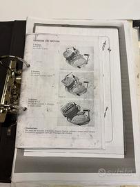Dossier con moltissimi cataloghi e immag moto ‘70