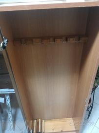 culla ,servizio posate e vetrina per fucili