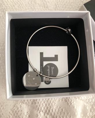Bracciale rigido con ciondoli corona